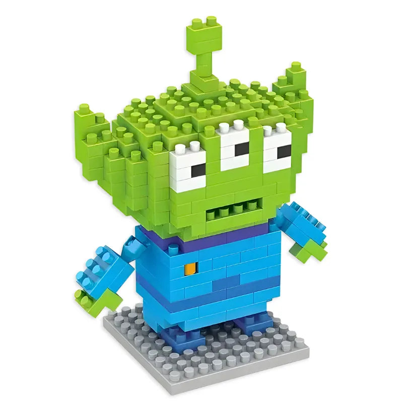 Figurine en brique Alien Toy Story - détail Diamond Bricks corps vert 3 yeux blancs combinaison bleue base noire 10cm 250 pièces